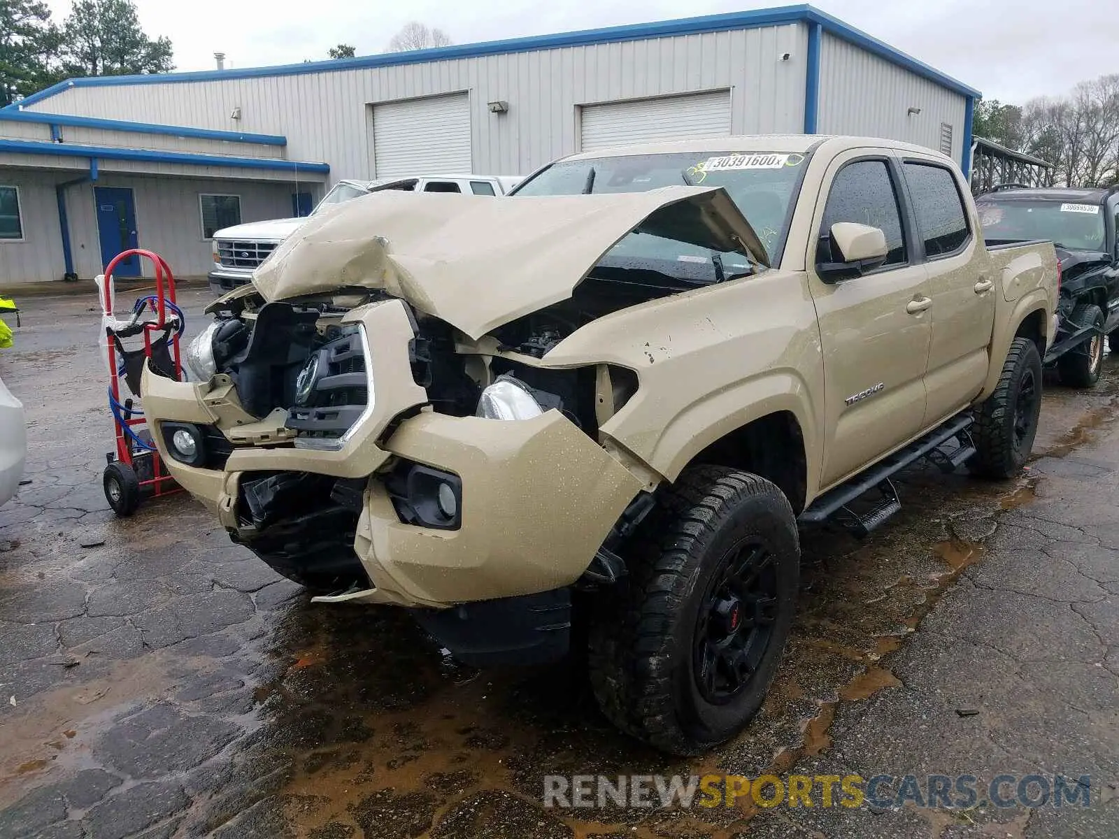 2 Photograph of a damaged car 5TFAX5GN1KX145024 TOYOTA TACOMA 2019