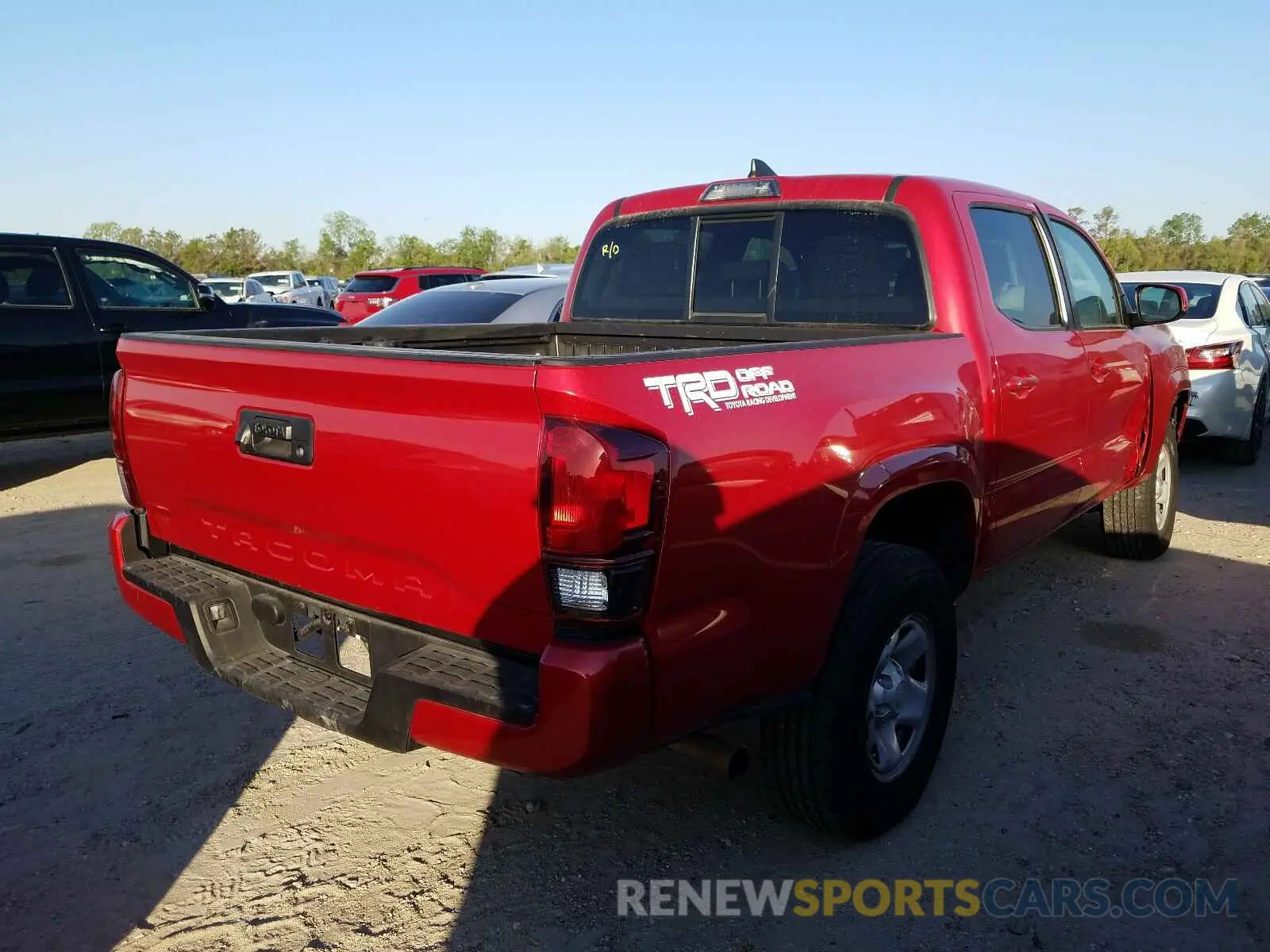 4 Photograph of a damaged car 5TFAX5GN1KX157402 TOYOTA TACOMA 2019
