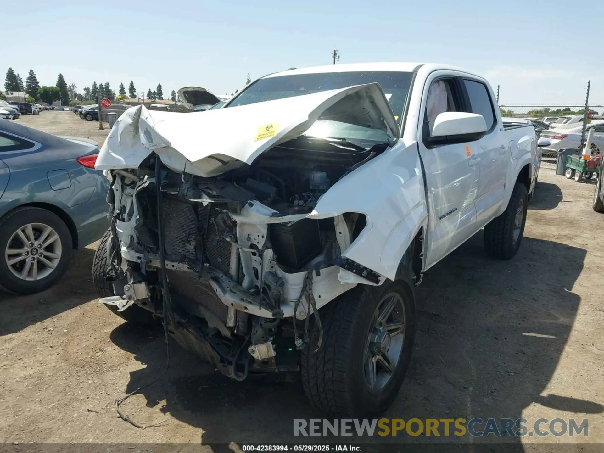 2 Photograph of a damaged car 5TFAX5GN2KX144352 TOYOTA TACOMA 2019