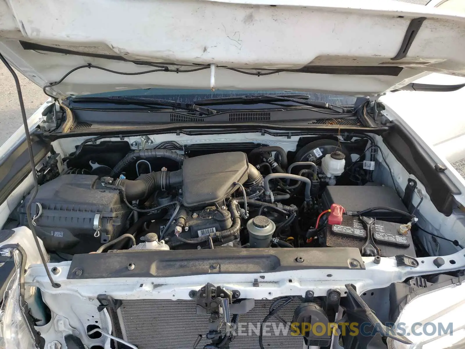 7 Photograph of a damaged car 5TFAX5GN2KX159014 TOYOTA TACOMA 2019