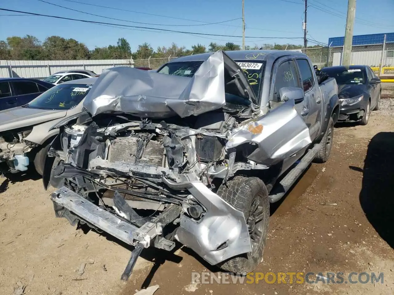 2 Photograph of a damaged car 5TFAX5GN3KX132730 TOYOTA TACOMA 2019