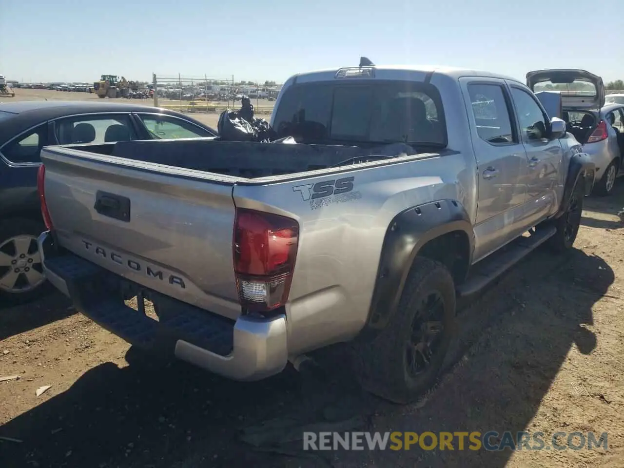 4 Photograph of a damaged car 5TFAX5GN3KX132730 TOYOTA TACOMA 2019