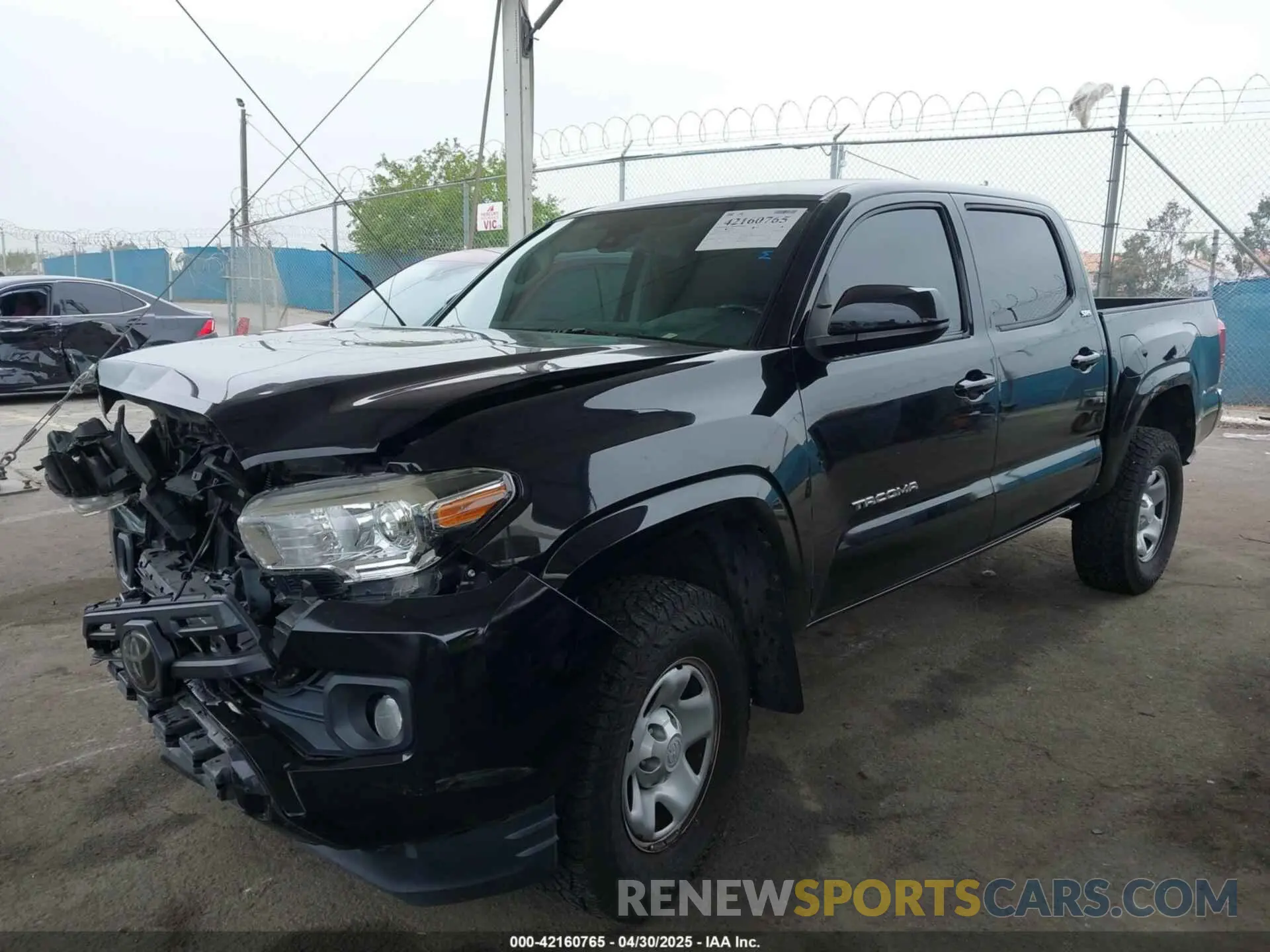 2 Photograph of a damaged car 5TFAX5GN5KX140795 TOYOTA TACOMA 2019