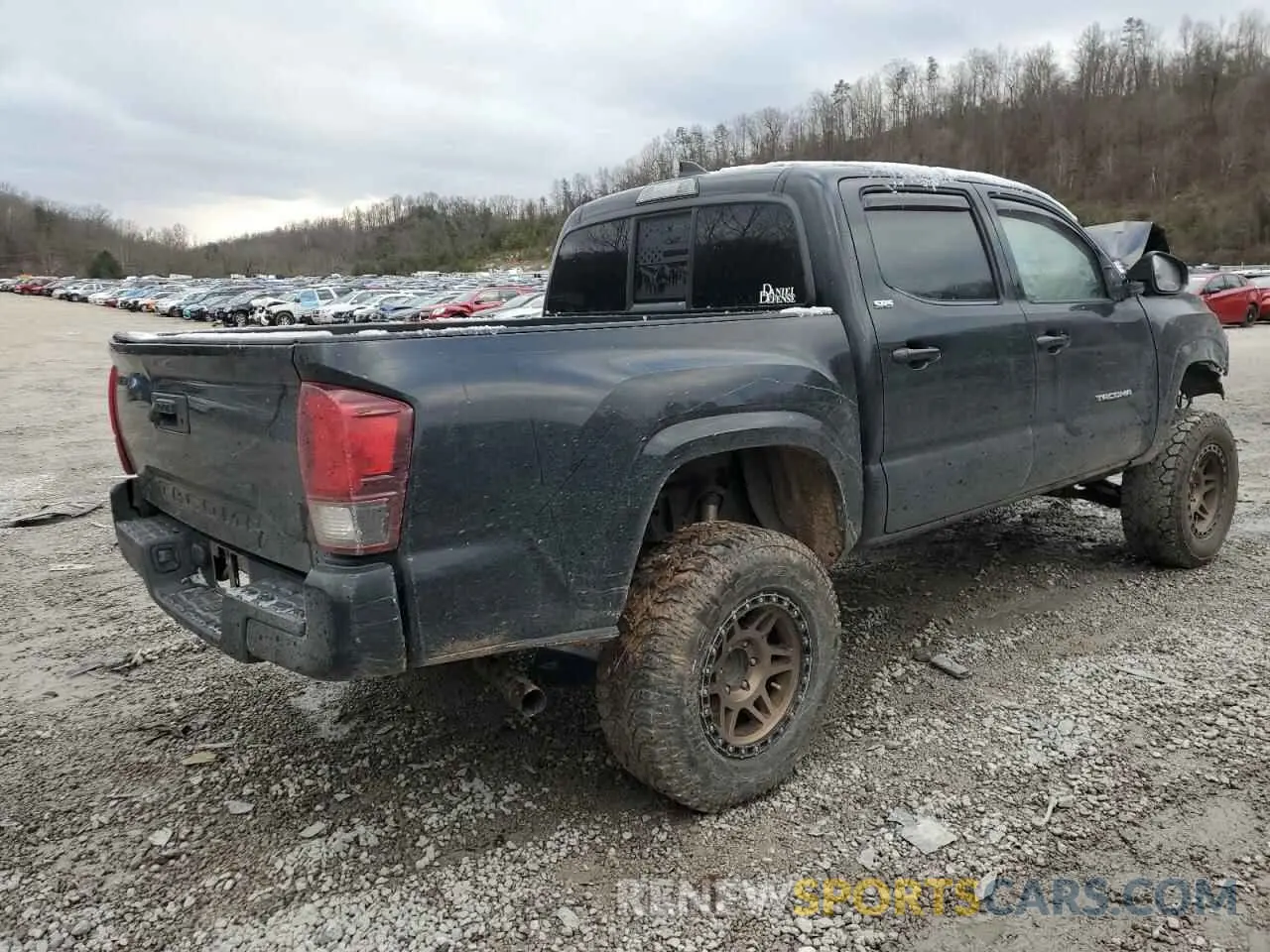 3 Photograph of a damaged car 5TFAX5GN8KX142542 TOYOTA TACOMA 2019