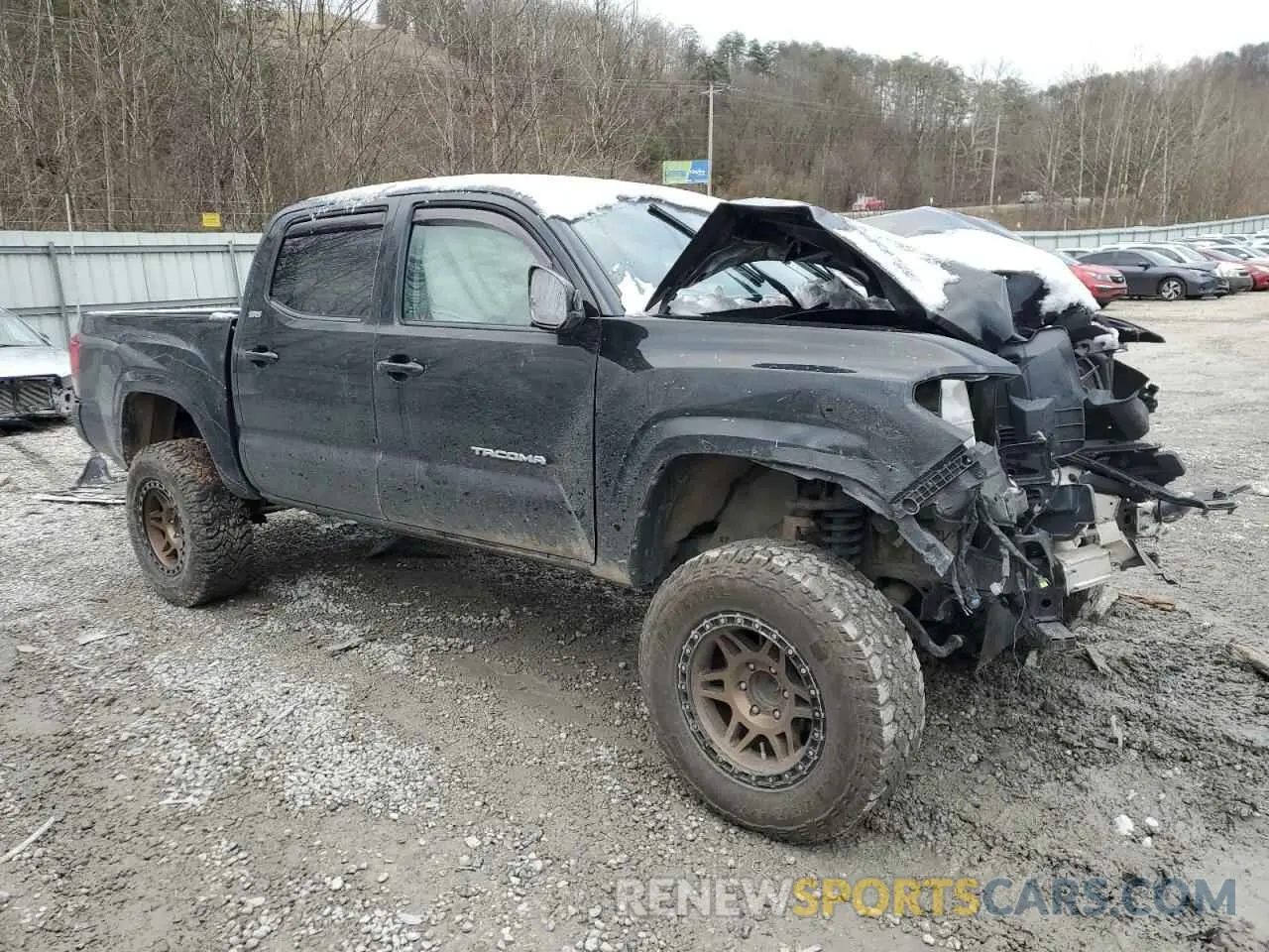 4 Photograph of a damaged car 5TFAX5GN8KX142542 TOYOTA TACOMA 2019