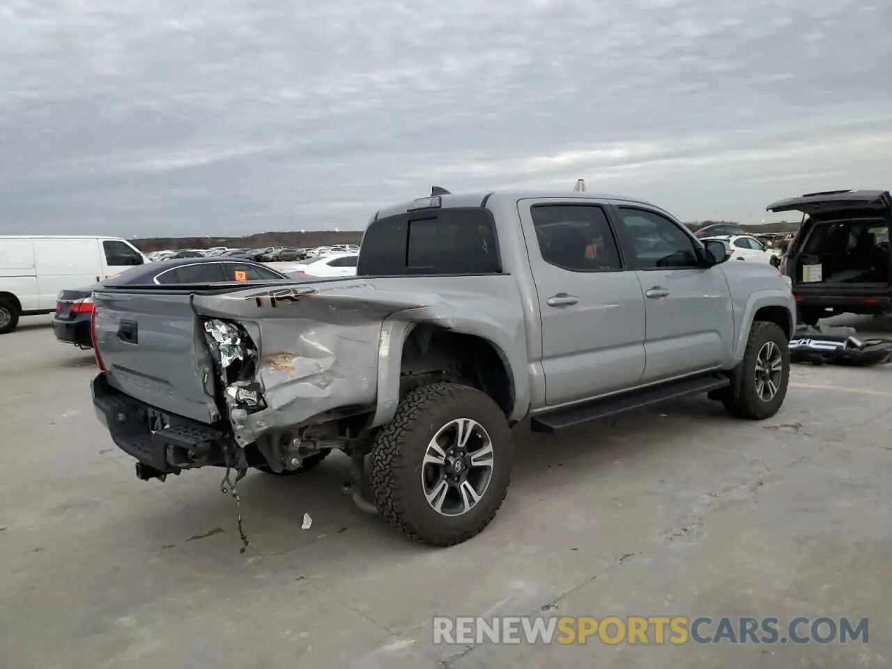 3 Photograph of a damaged car 5TFAZ5CN0KX077962 TOYOTA TACOMA 2019