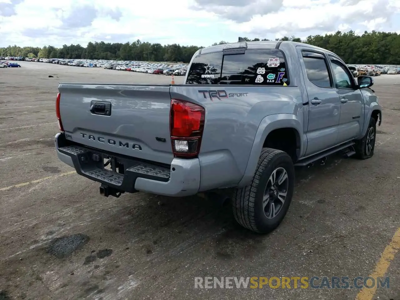 4 Photograph of a damaged car 5TFAZ5CN0KX084135 TOYOTA TACOMA 2019