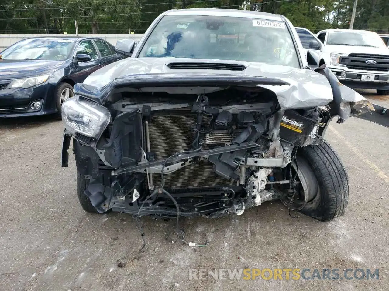 9 Photograph of a damaged car 5TFAZ5CN0KX084135 TOYOTA TACOMA 2019