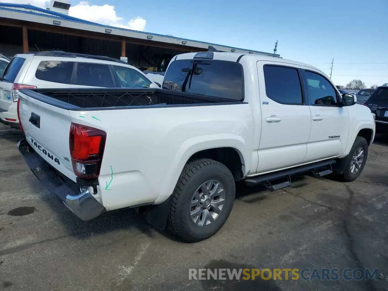 3 Photograph of a damaged car 5TFAZ5CN1KX086878 TOYOTA TACOMA 2019