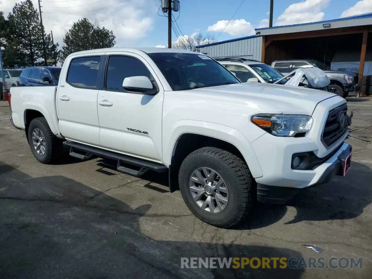 4 Photograph of a damaged car 5TFAZ5CN1KX086878 TOYOTA TACOMA 2019