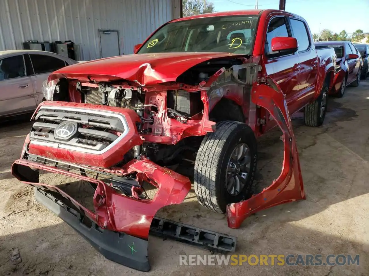 2 Photograph of a damaged car 5TFAZ5CN2KX075453 TOYOTA TACOMA 2019