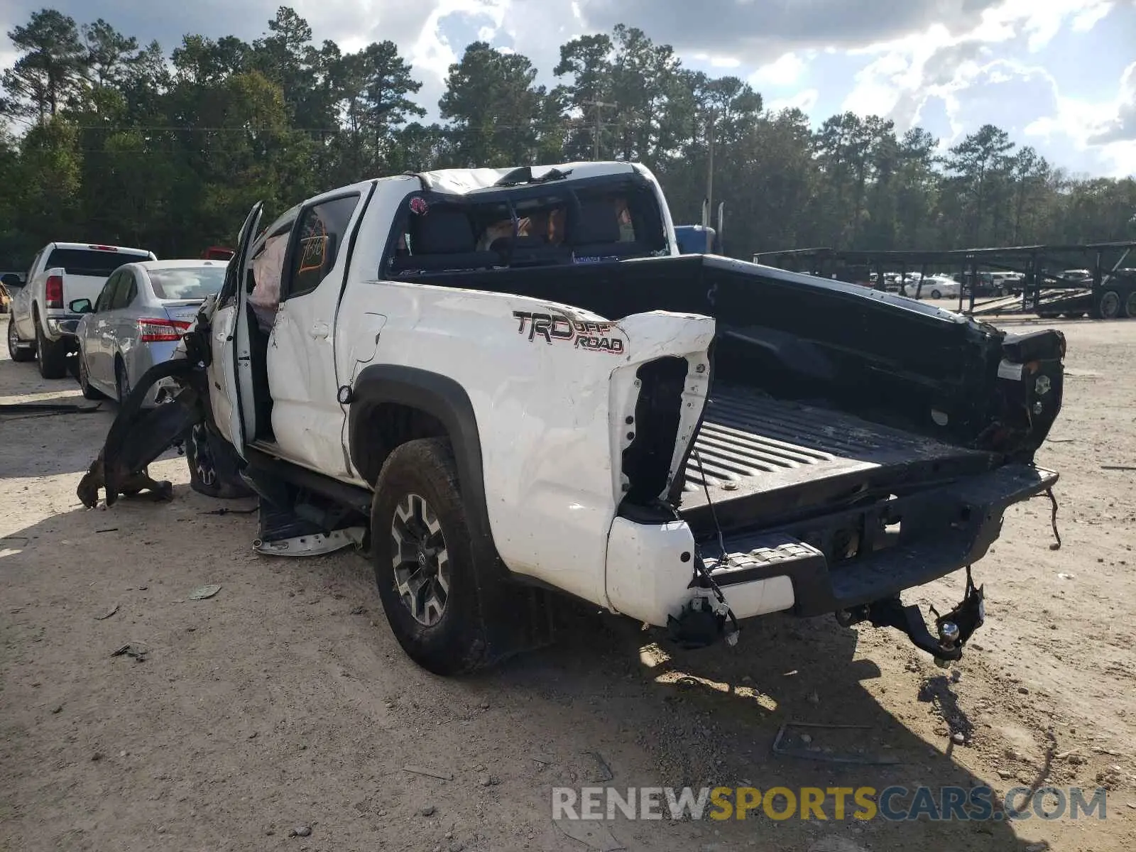 3 Photograph of a damaged car 5TFAZ5CN2KX083276 TOYOTA TACOMA 2019