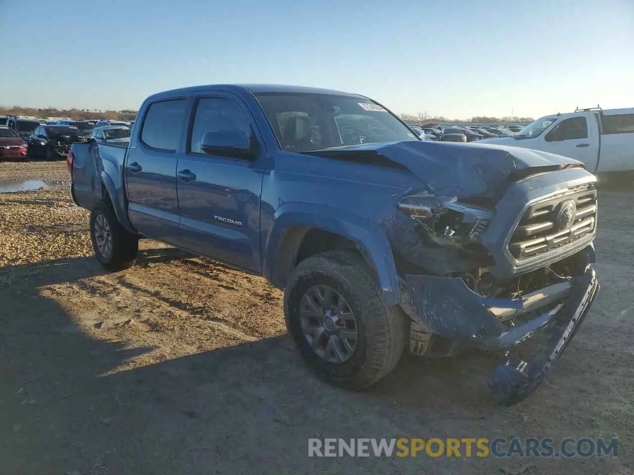 4 Photograph of a damaged car 5TFAZ5CN2KX083908 TOYOTA TACOMA 2019
