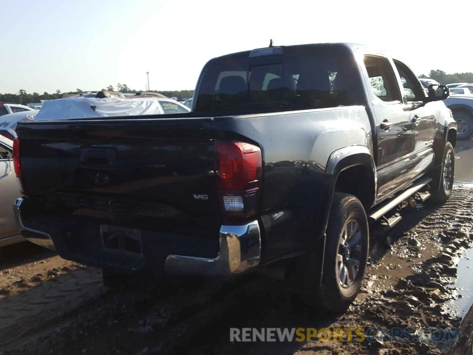 4 Photograph of a damaged car 5TFAZ5CN5KX073275 TOYOTA TACOMA 2019