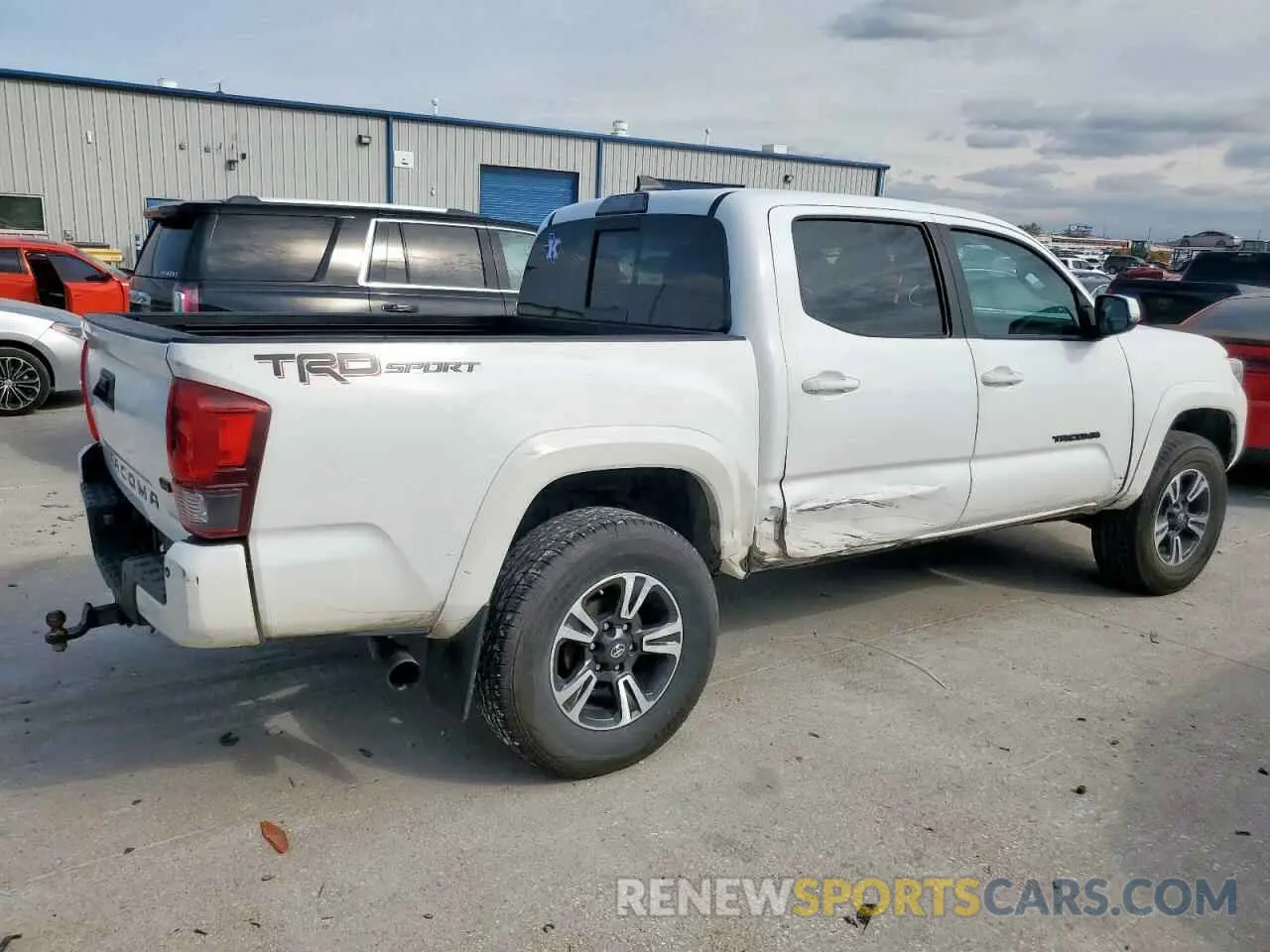 3 Photograph of a damaged car 5TFAZ5CN5KX084616 TOYOTA TACOMA 2019