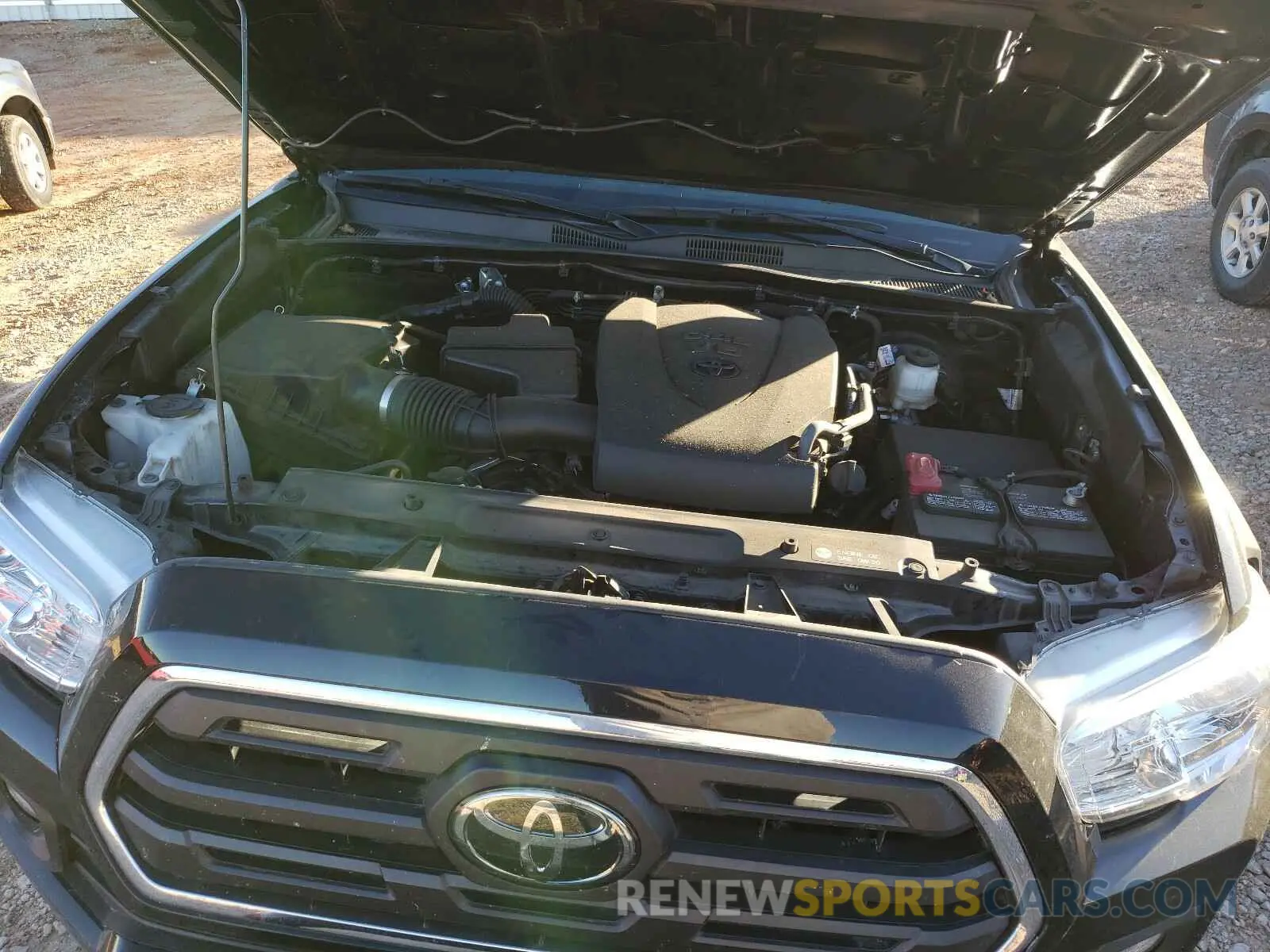 7 Photograph of a damaged car 5TFAZ5CN6KX073317 TOYOTA TACOMA 2019