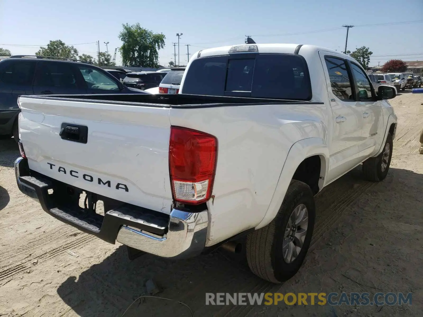 4 Photograph of a damaged car 5TFAZ5CN7KX086092 TOYOTA TACOMA 2019