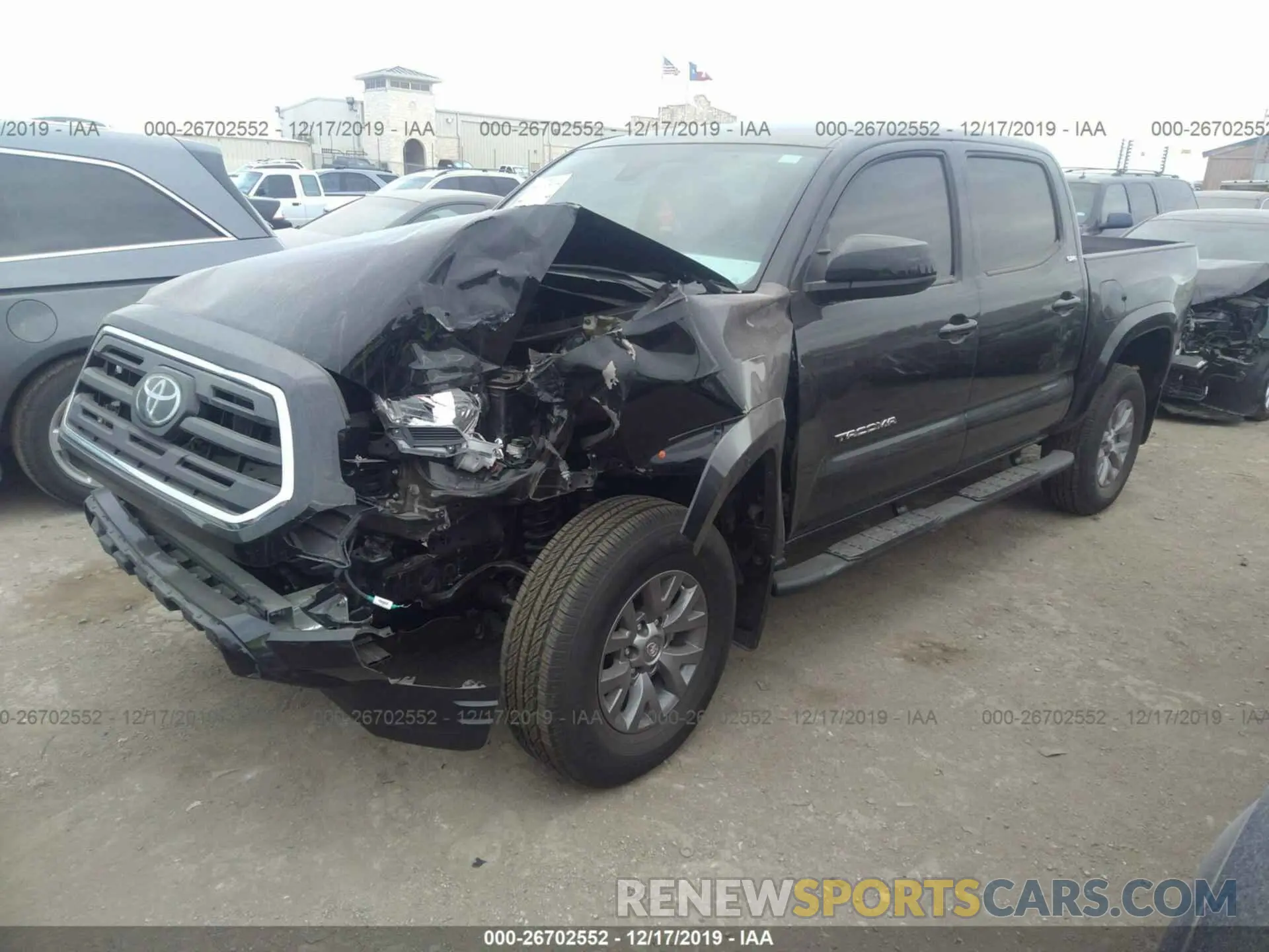 2 Photograph of a damaged car 5TFAZ5CN9KX082691 TOYOTA TACOMA 2019