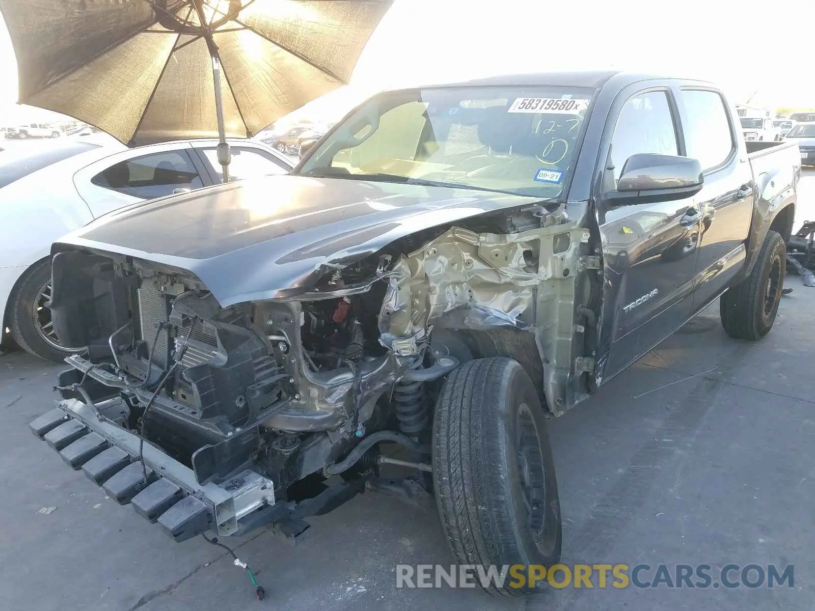 2 Photograph of a damaged car 5TFAZ5CNXKX085289 TOYOTA TACOMA 2019
