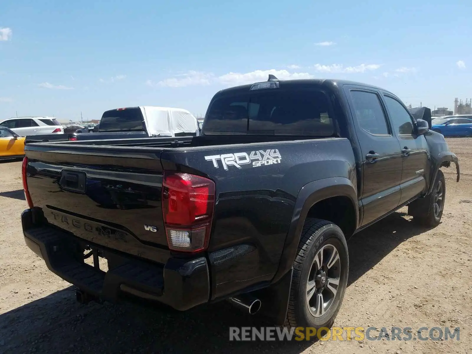 4 Photograph of a damaged car 5TFCZ5AN0KX171755 TOYOTA TACOMA 2019