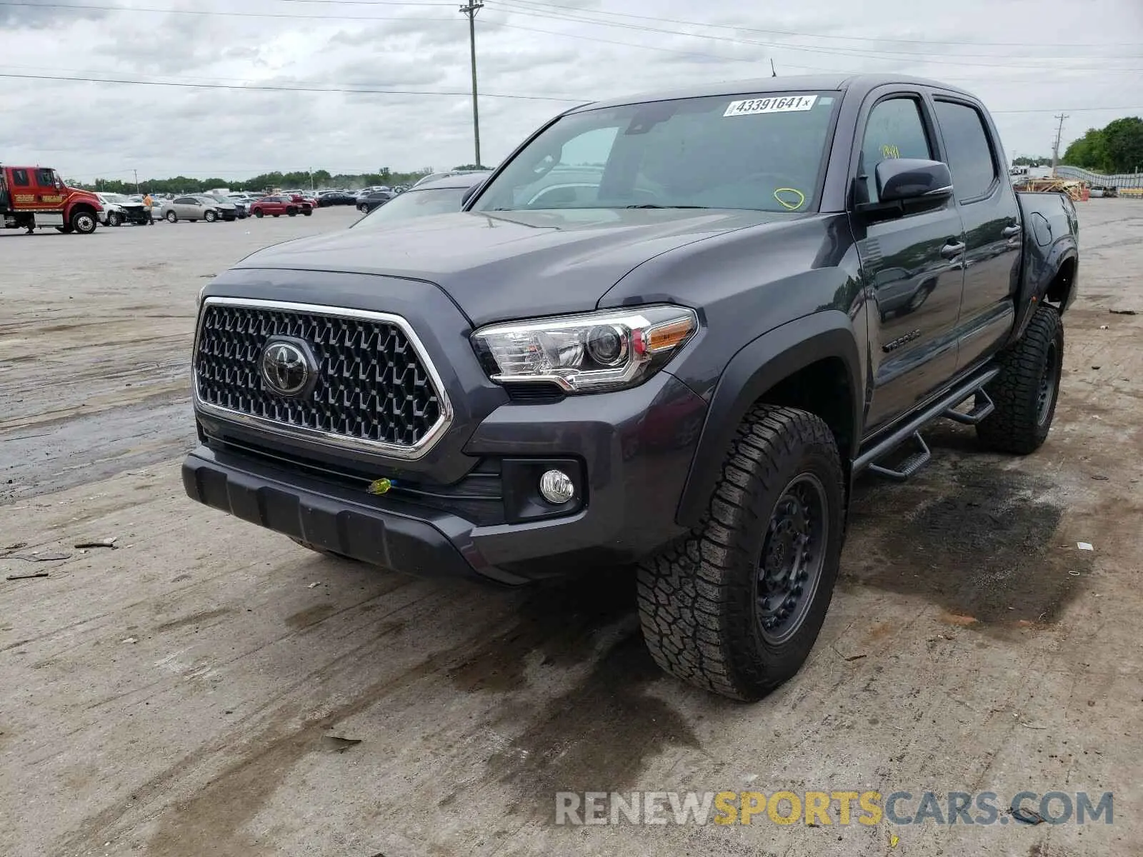 2 Photograph of a damaged car 5TFCZ5AN0KX172226 TOYOTA TACOMA 2019
