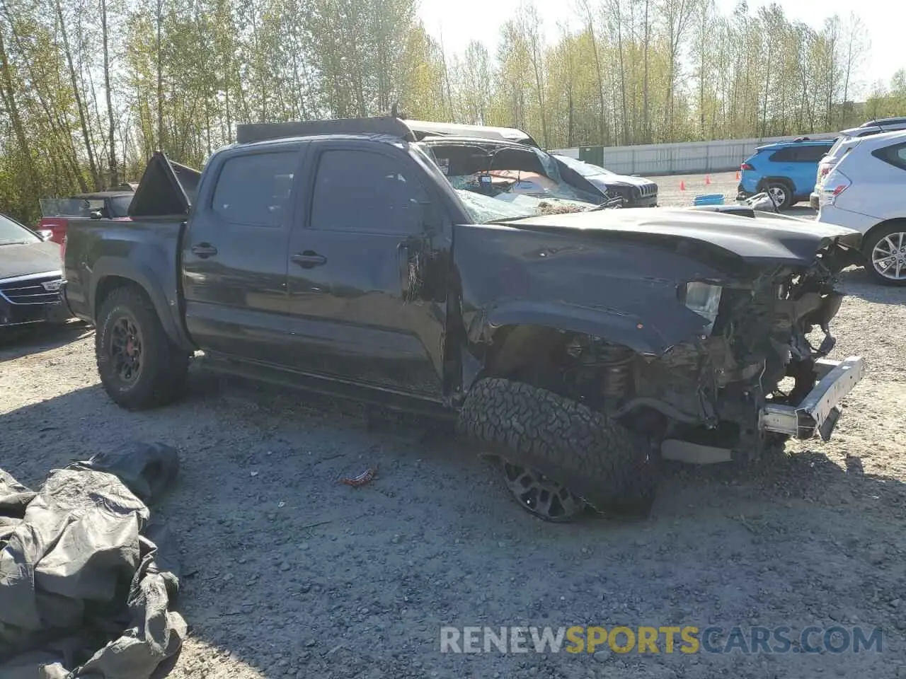 4 Photograph of a damaged car 5TFCZ5AN1KX192372 TOYOTA TACOMA 2019