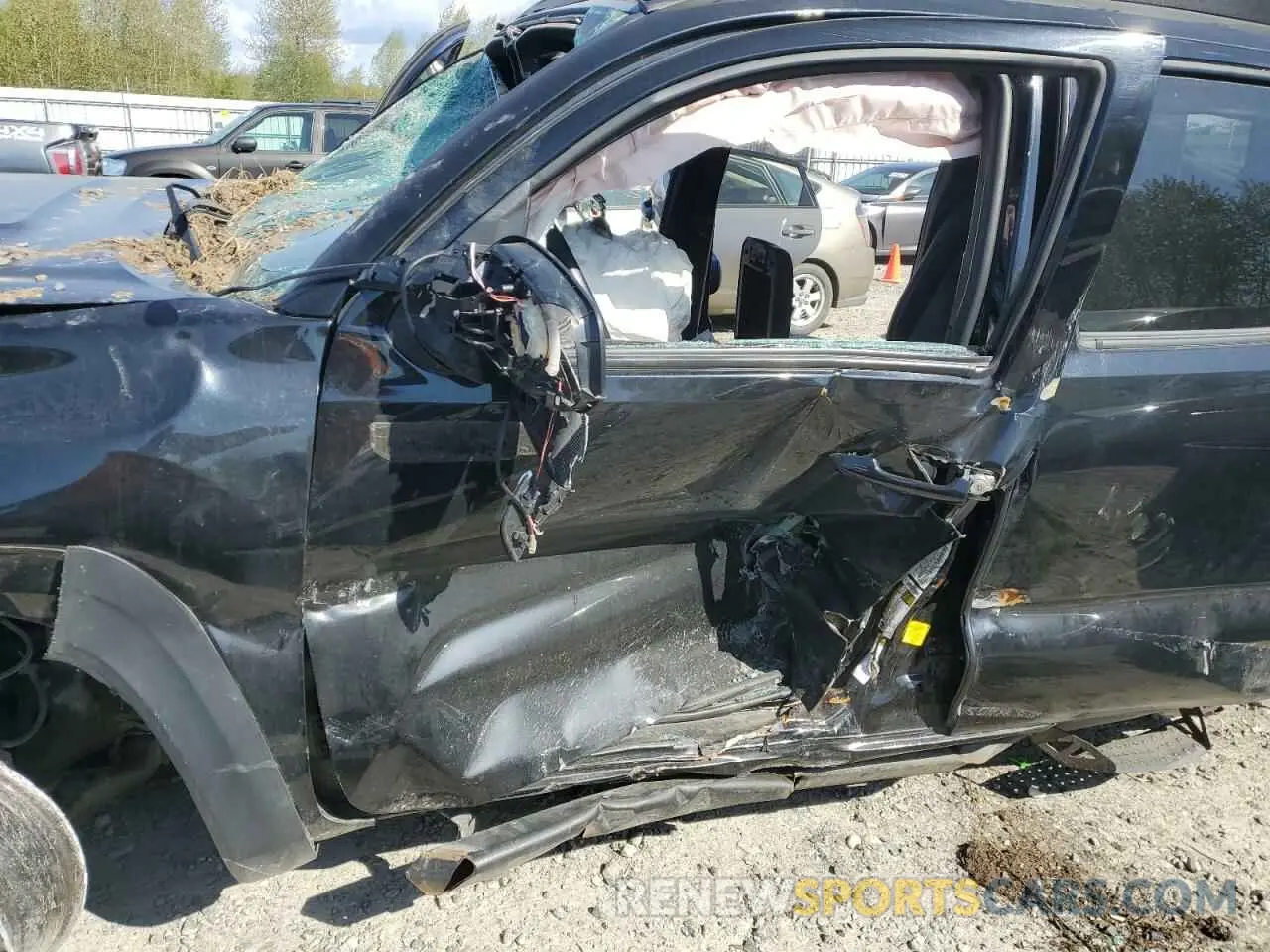7 Photograph of a damaged car 5TFCZ5AN1KX192372 TOYOTA TACOMA 2019