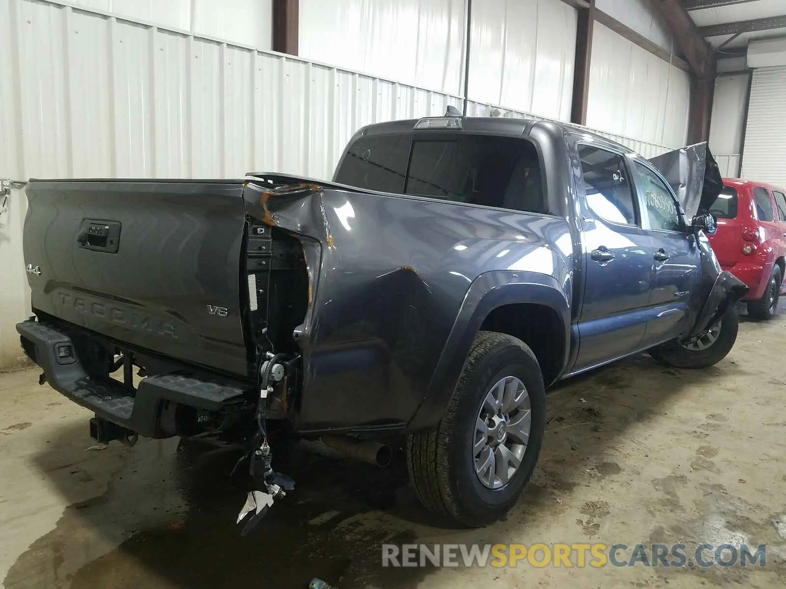 4 Photograph of a damaged car 5TFCZ5AN1KX194560 TOYOTA TACOMA 2019