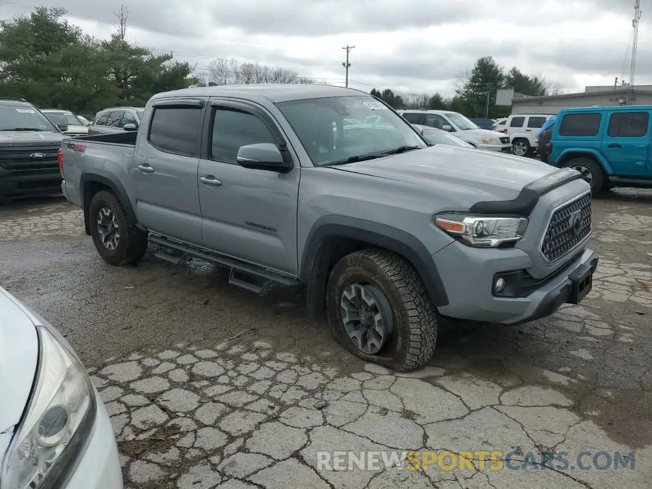 4 Фотография поврежденного автомобиля 5TFCZ5AN1KX203127 TOYOTA TACOMA 2019