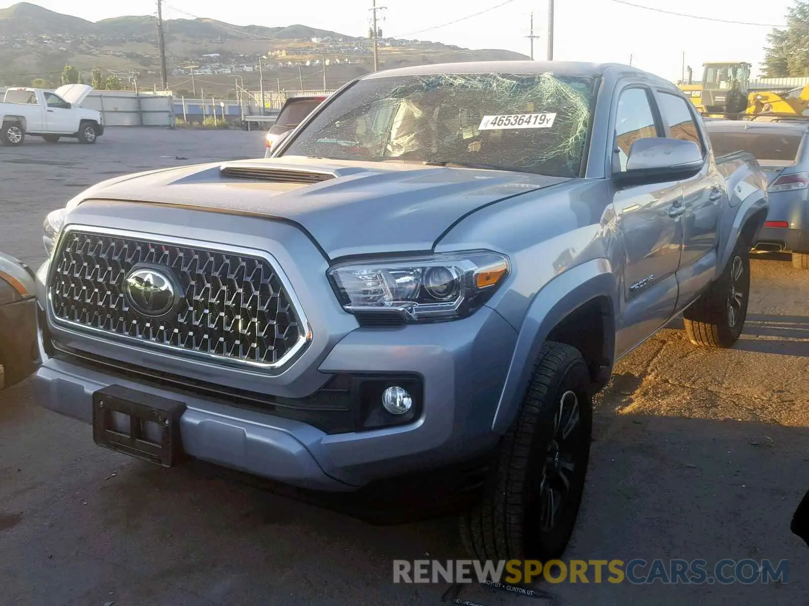 2 Photograph of a damaged car 5TFCZ5AN3KX171989 TOYOTA TACOMA 2019