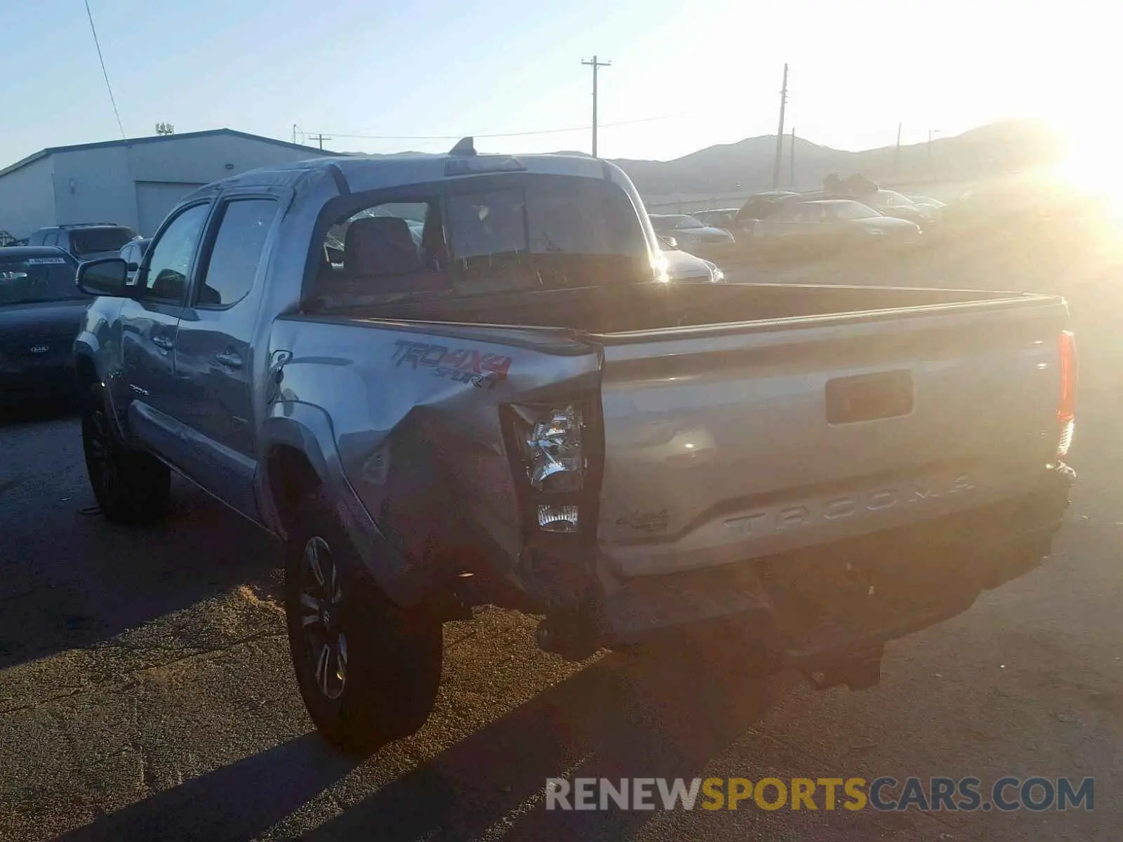 3 Photograph of a damaged car 5TFCZ5AN3KX171989 TOYOTA TACOMA 2019