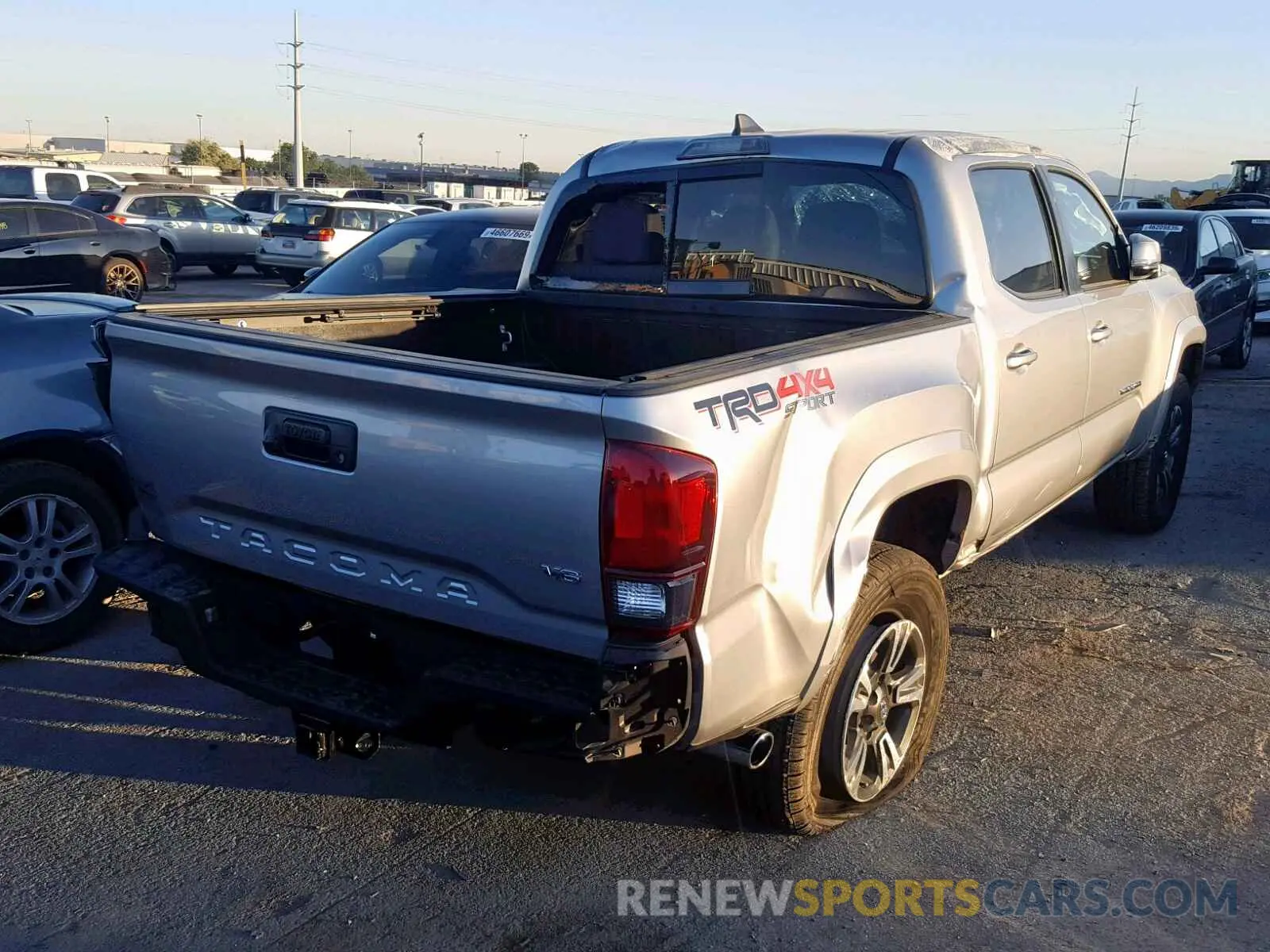 4 Photograph of a damaged car 5TFCZ5AN3KX171989 TOYOTA TACOMA 2019