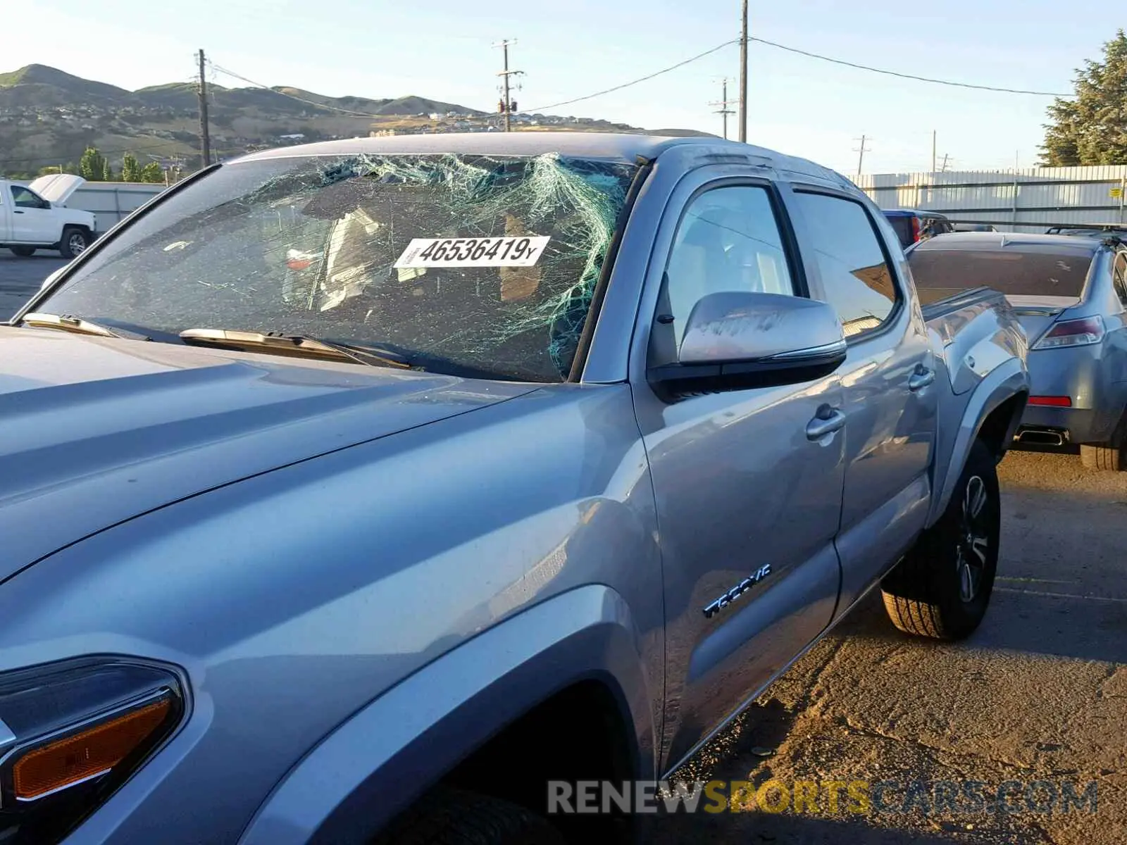 9 Photograph of a damaged car 5TFCZ5AN3KX171989 TOYOTA TACOMA 2019