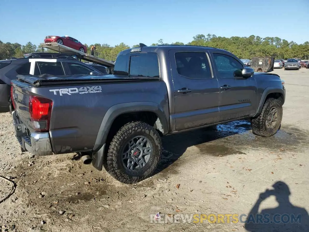 3 Photograph of a damaged car 5TFCZ5AN3KX196259 TOYOTA TACOMA 2019