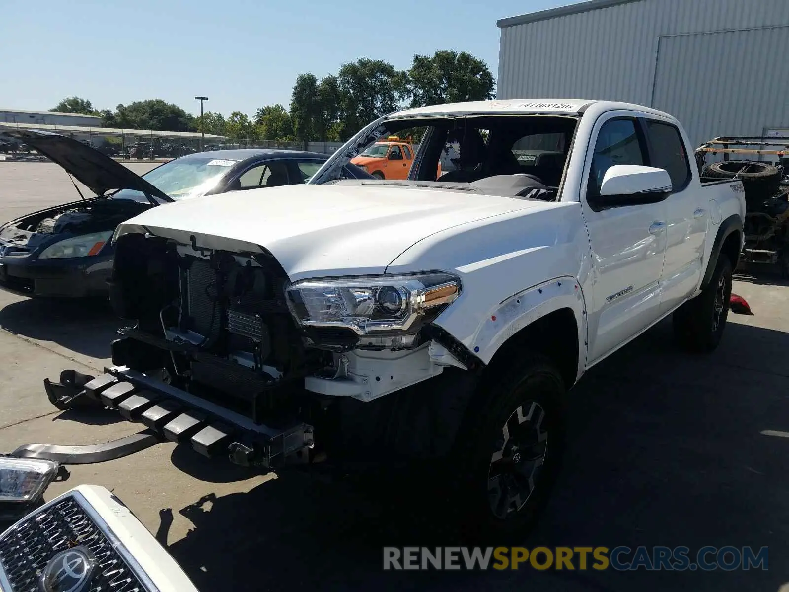 2 Photograph of a damaged car 5TFCZ5AN3KX197377 TOYOTA TACOMA 2019