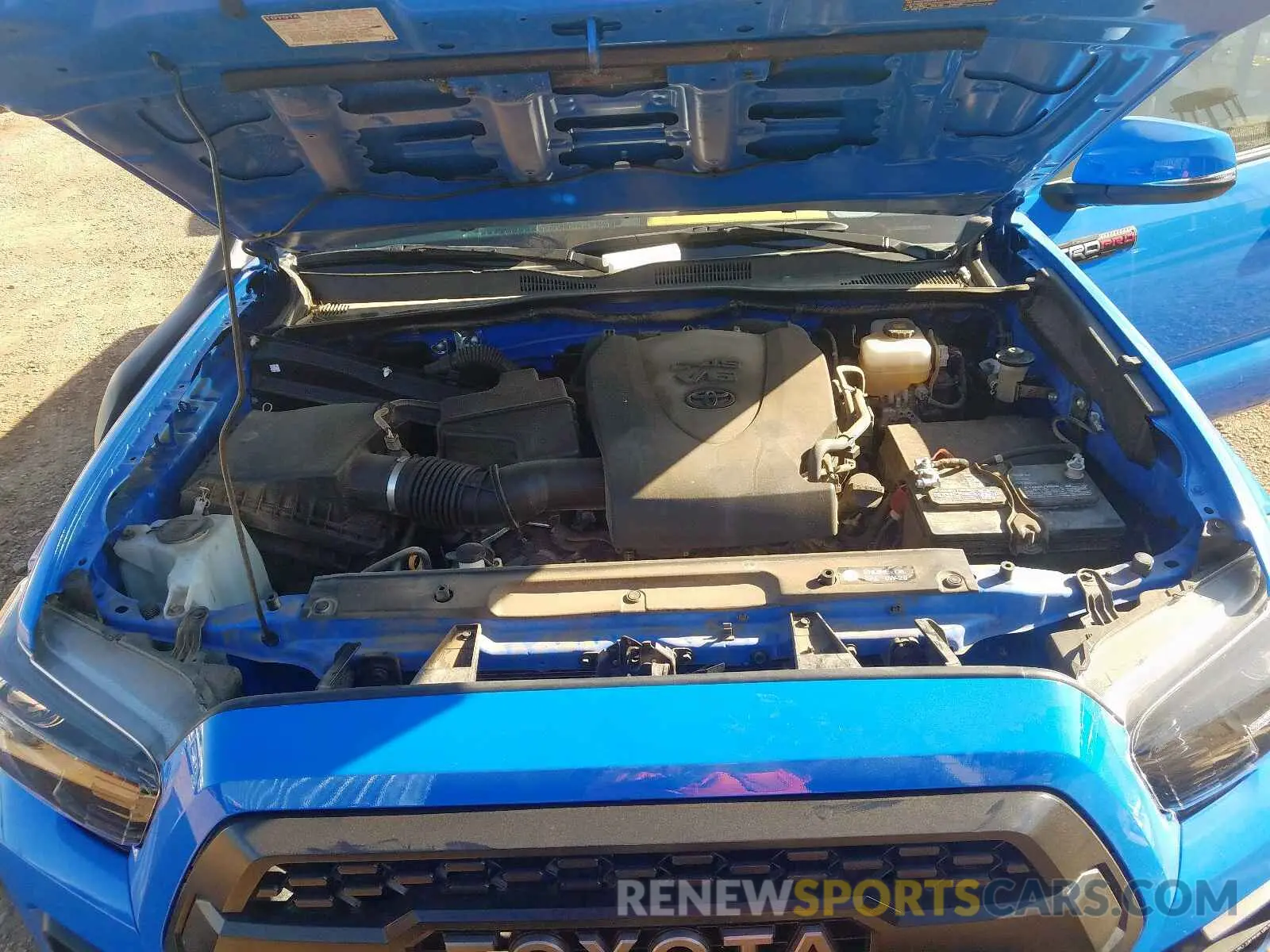 7 Photograph of a damaged car 5TFCZ5AN4KX169944 TOYOTA TACOMA 2019