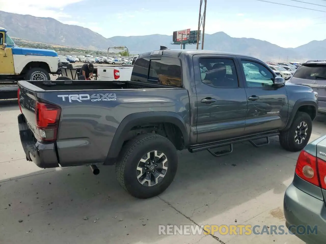 3 Photograph of a damaged car 5TFCZ5AN4KX180801 TOYOTA TACOMA 2019