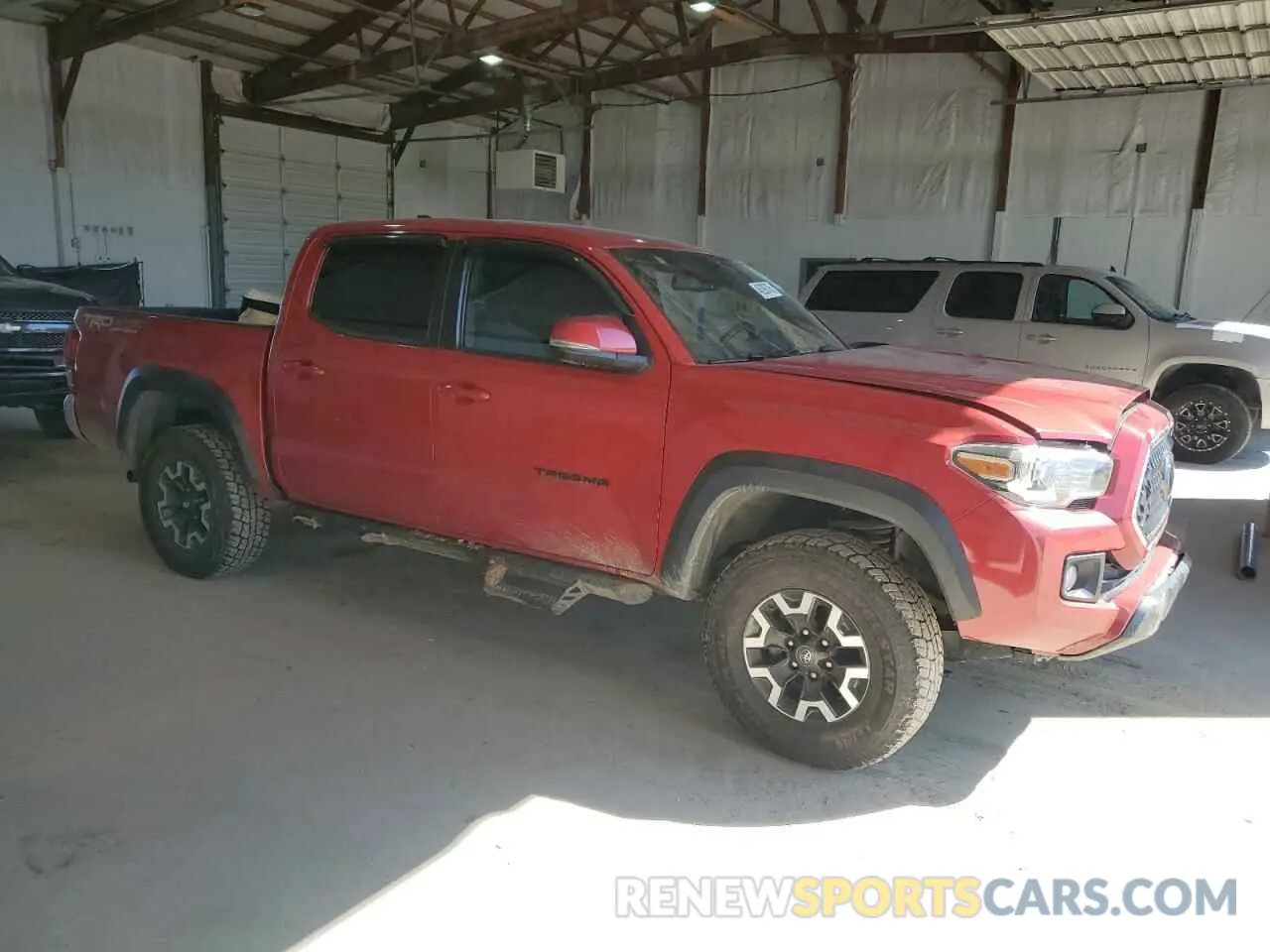 4 Photograph of a damaged car 5TFCZ5AN5KX188874 TOYOTA TACOMA 2019