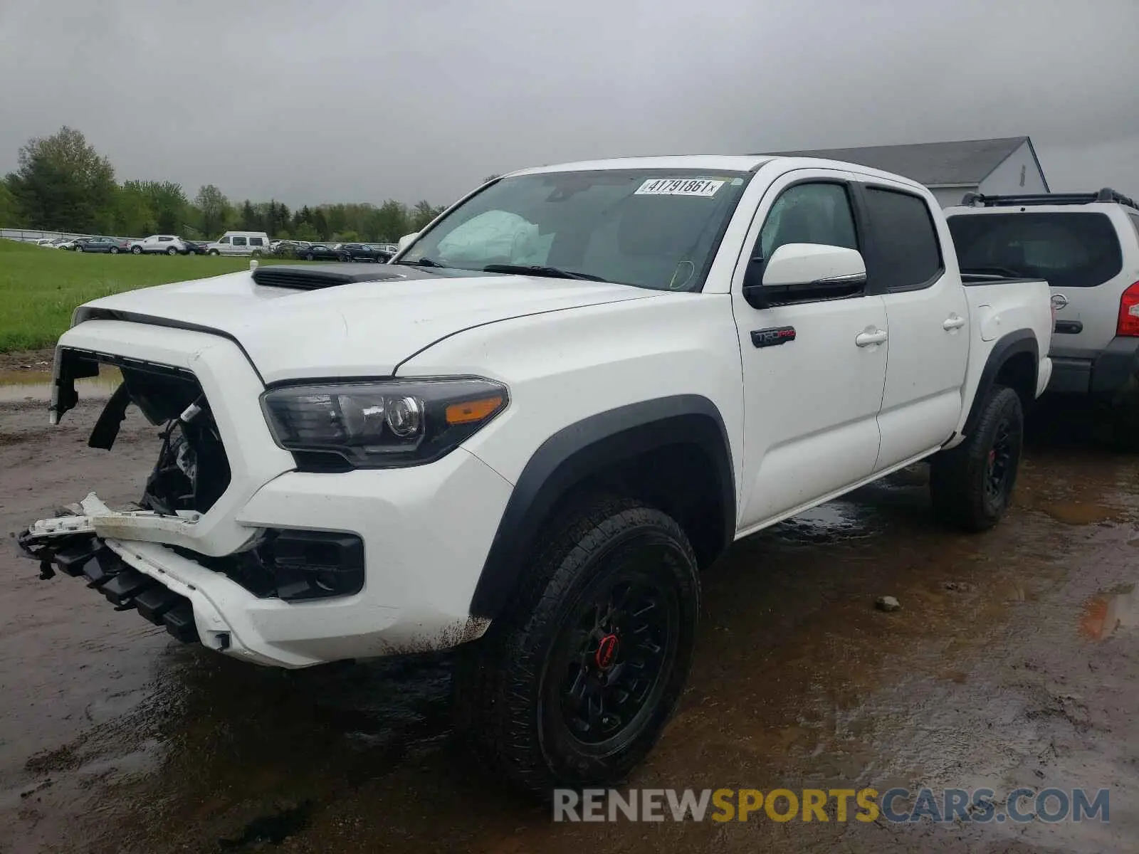 2 Photograph of a damaged car 5TFCZ5AN5KX195128 TOYOTA TACOMA 2019
