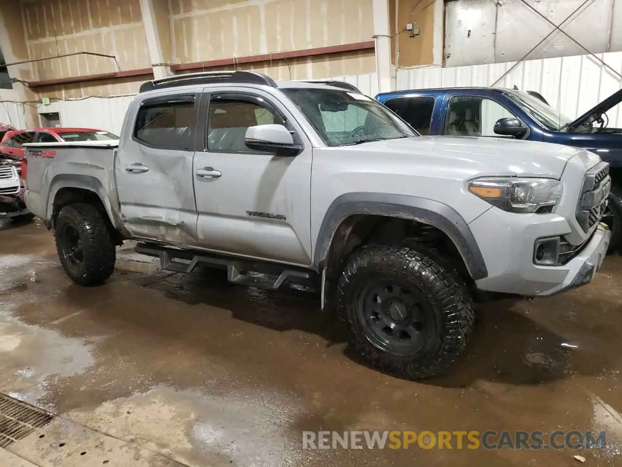 4 Photograph of a damaged car 5TFCZ5AN5KX200408 TOYOTA TACOMA 2019