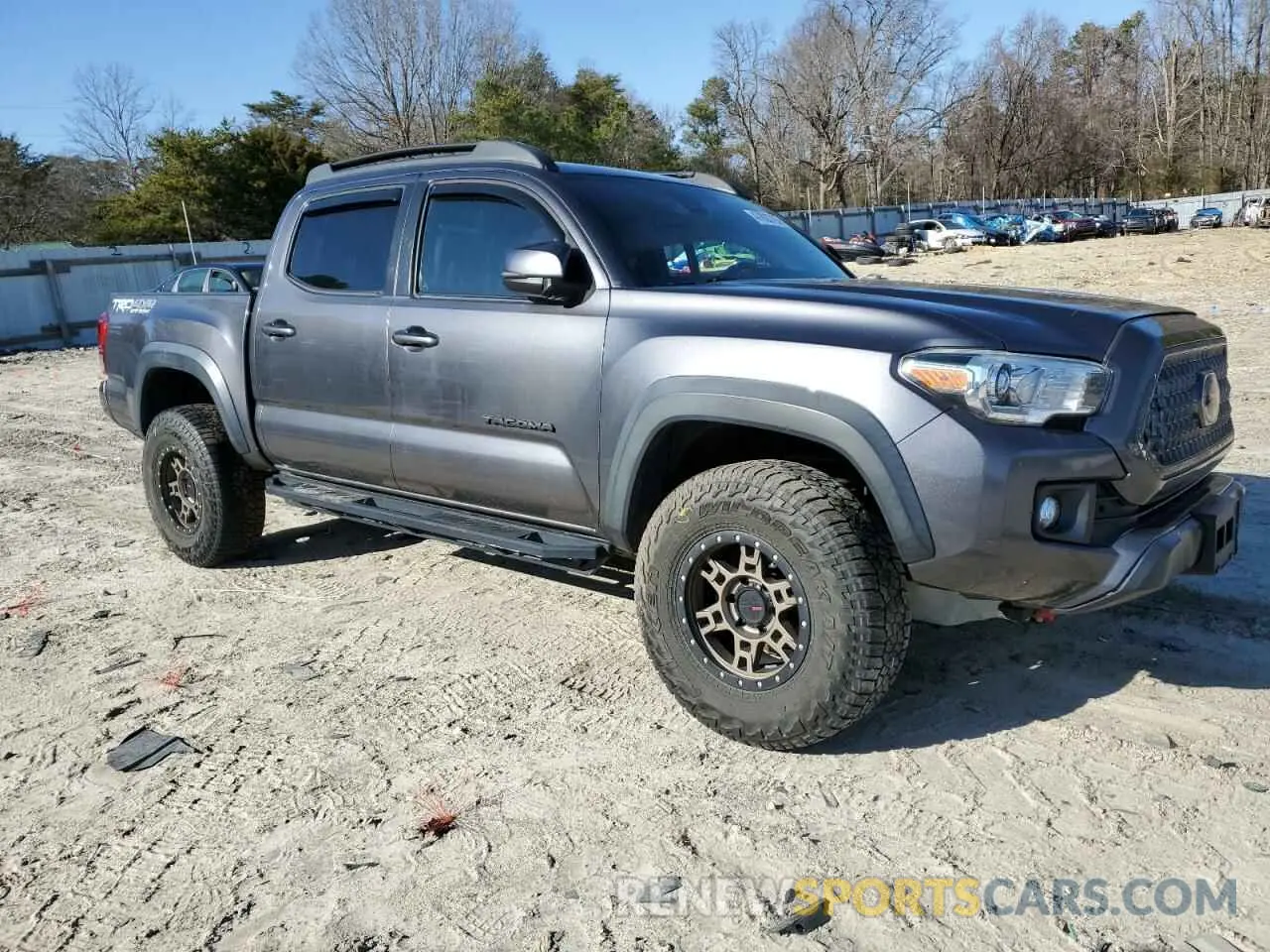4 Photograph of a damaged car 5TFCZ5AN7KX190206 TOYOTA TACOMA 2019