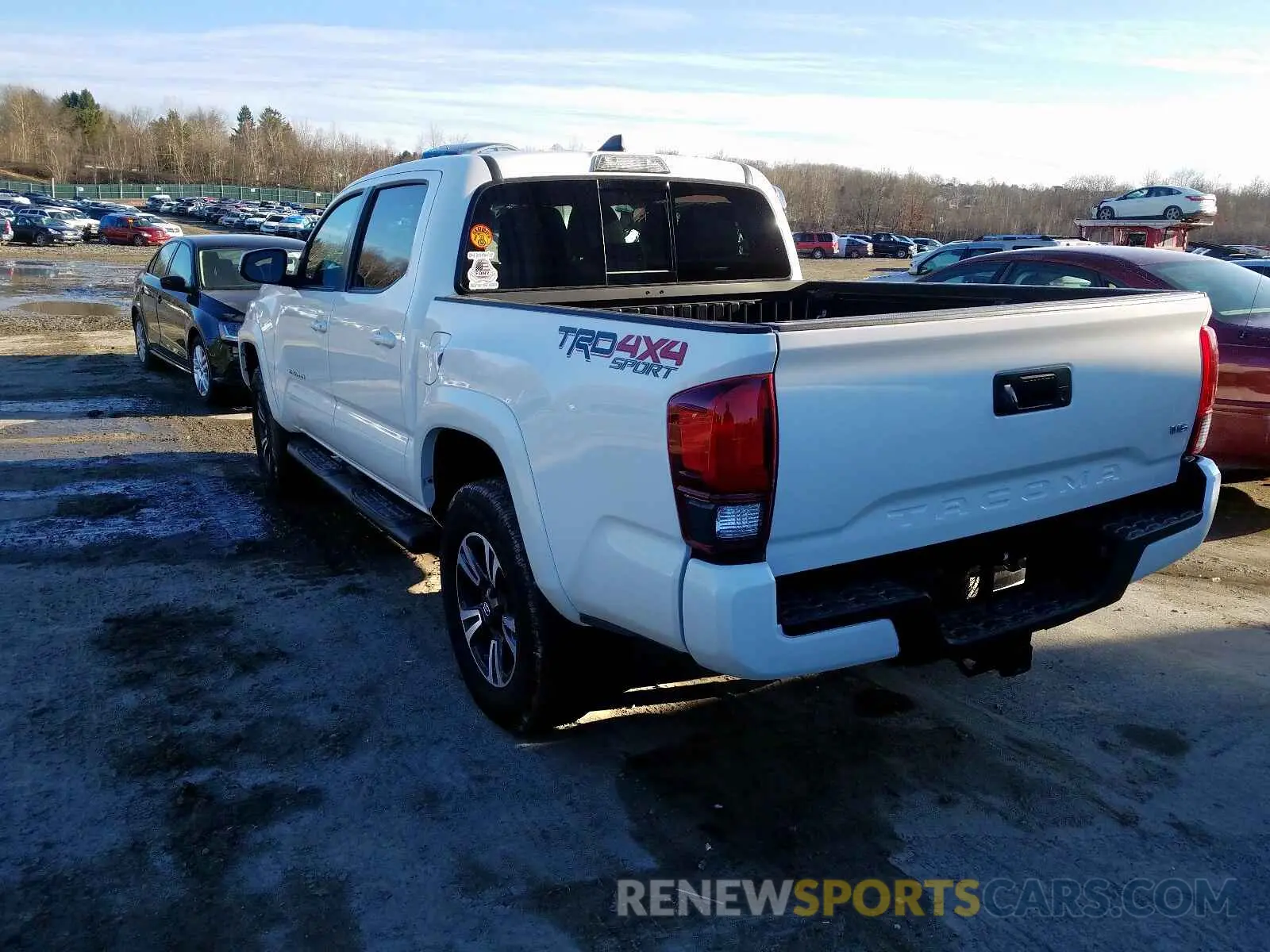 3 Photograph of a damaged car 5TFCZ5AN8KX191171 TOYOTA TACOMA 2019