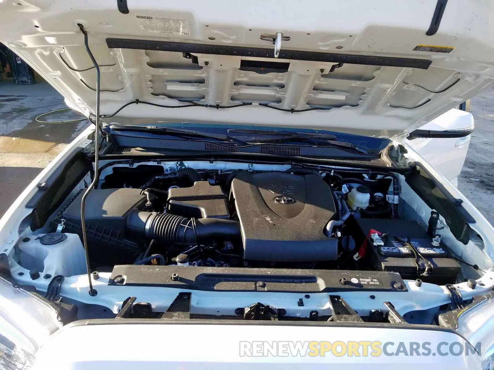 7 Photograph of a damaged car 5TFCZ5AN8KX191171 TOYOTA TACOMA 2019