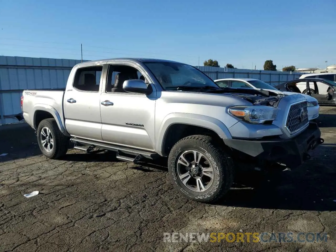 4 Photograph of a damaged car 5TFCZ5ANXKX191415 TOYOTA TACOMA 2019