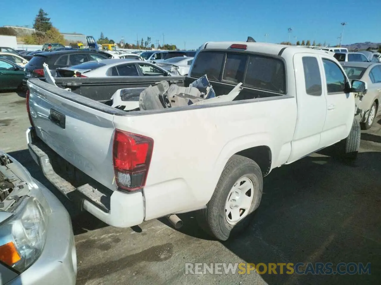 4 Photograph of a damaged car 5TFRX5GN5KX139410 TOYOTA TACOMA 2019