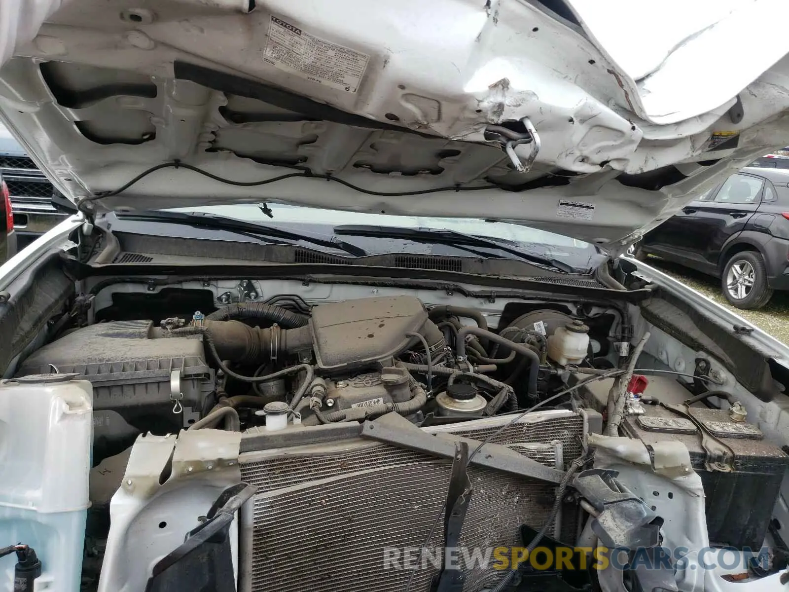 7 Photograph of a damaged car 5TFRX5GN6KX135611 TOYOTA TACOMA 2019