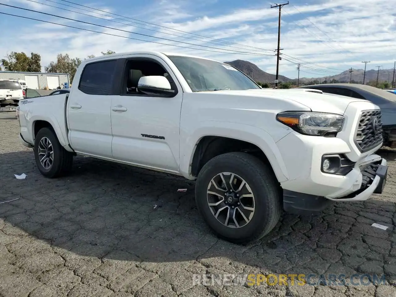 4 Photograph of a damaged car 3TMAZ5CN0LM140338 TOYOTA TACOMA 2020