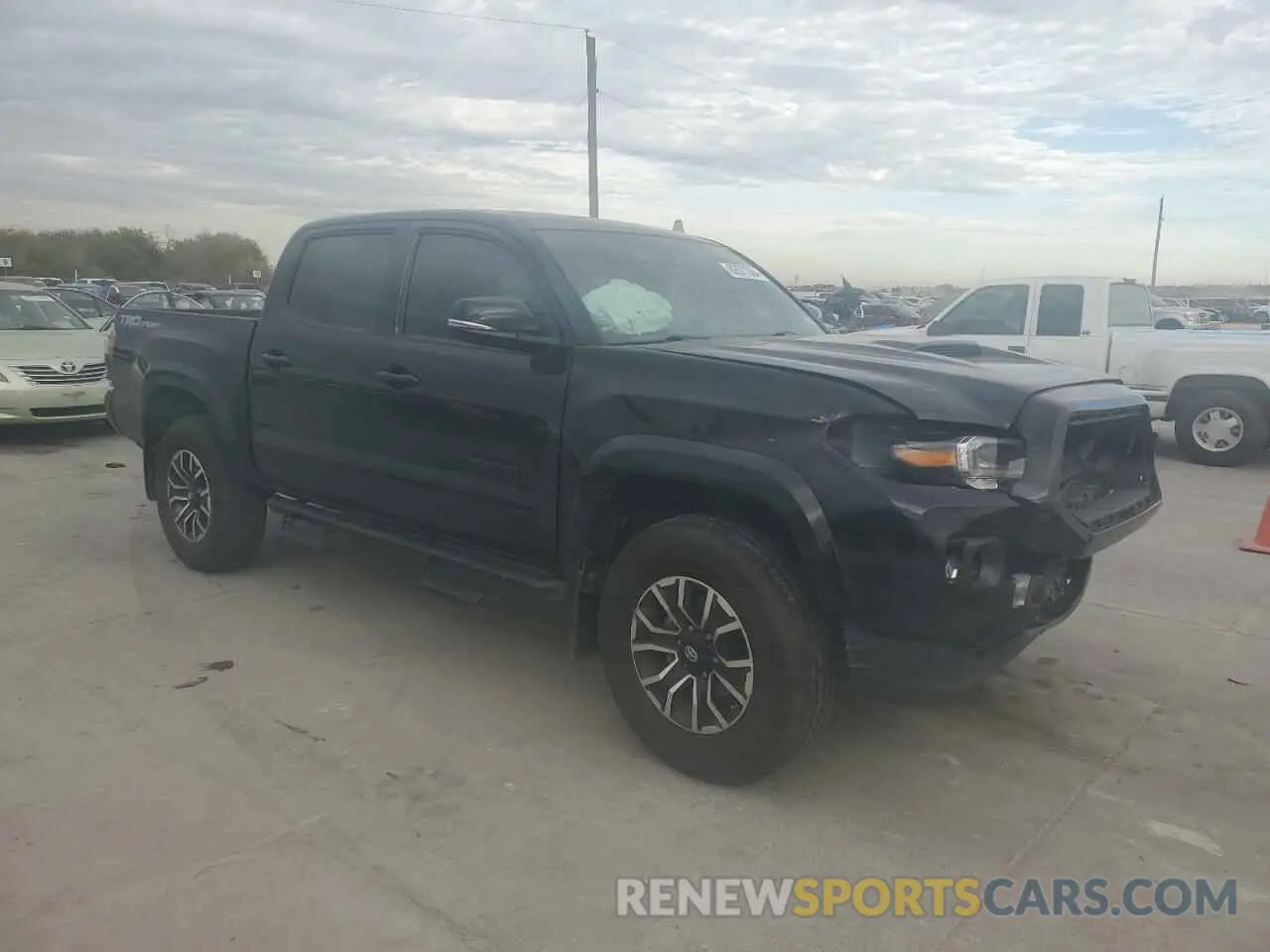 4 Photograph of a damaged car 3TMAZ5CN7LM135332 TOYOTA TACOMA 2020