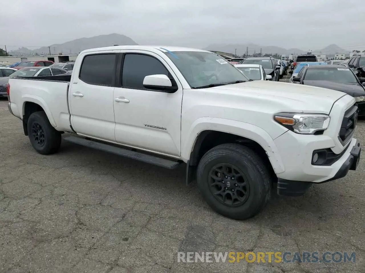 4 Photograph of a damaged car 3TMBZ5DN3LM027258 TOYOTA TACOMA 2020