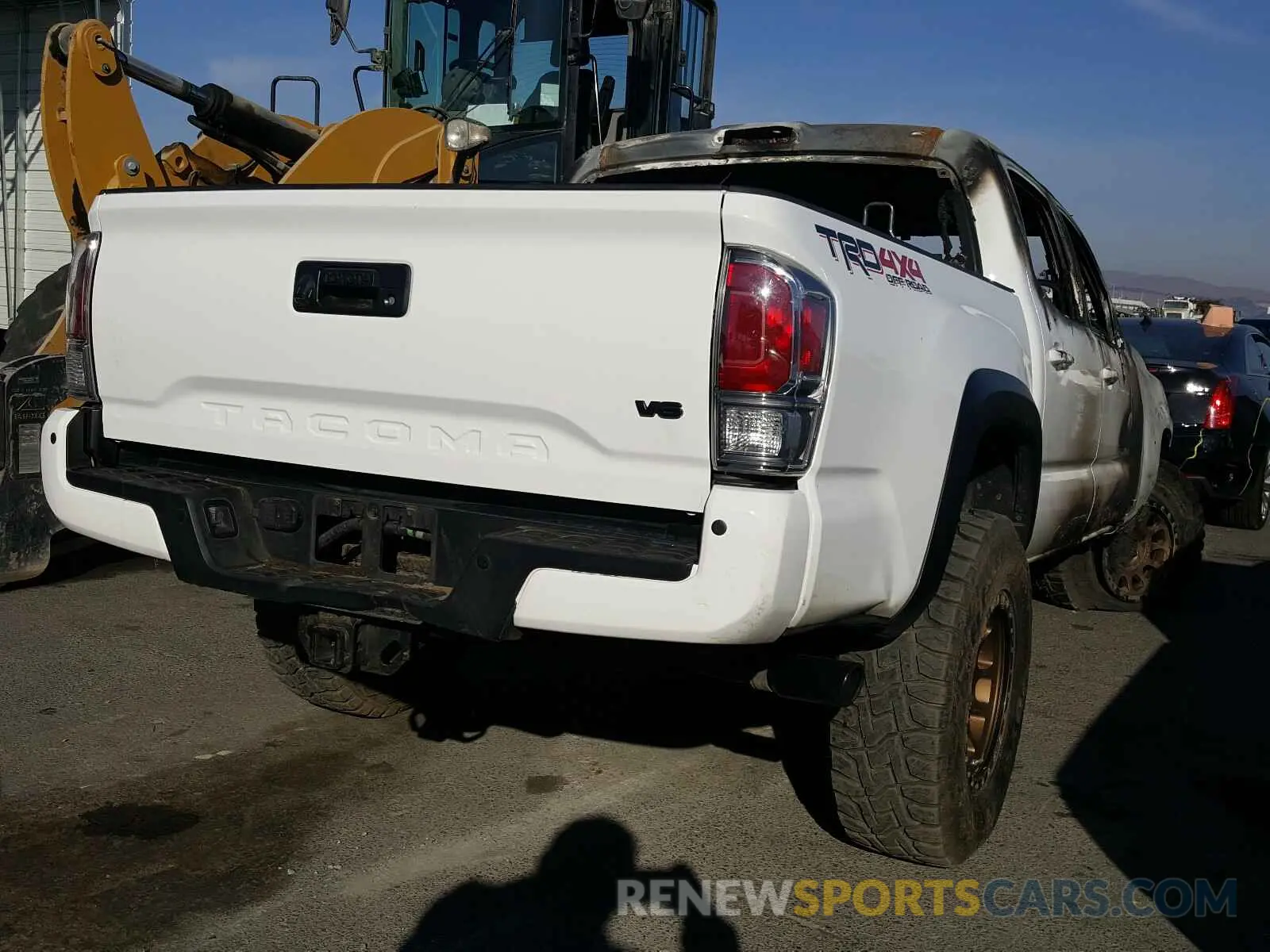 4 Photograph of a damaged car 3TMCZ5AN3LM303365 TOYOTA TACOMA 2020
